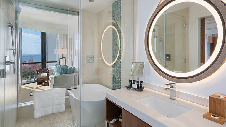 A standalone tub sits inside a walk-in shower. // © 2017 Hyatt Centric Waikiki Beach