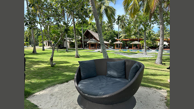 Couples have plenty of places to relax around the resort’s lush grounds.