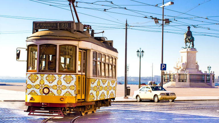 Discover Lisbon by streetcar; tram No. 28 takes travelers through many must-see districts. // © 2017 iStock