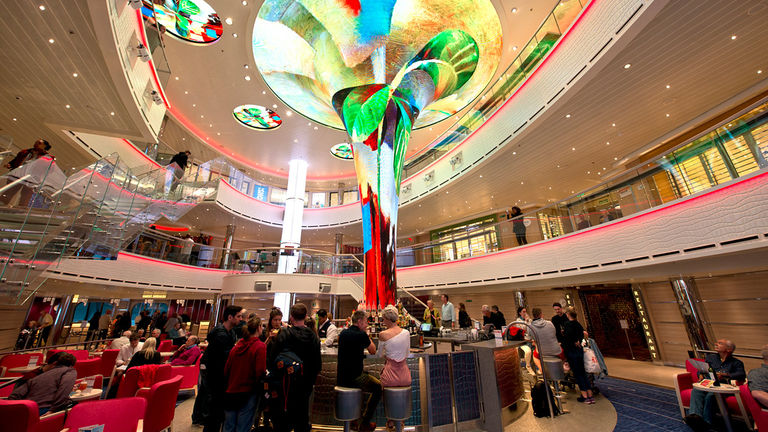 From the start of their cruise, guests are welcomed onboard with pops of color and by friendly staffers.