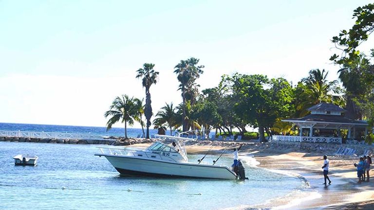 Guests can choose to participate in fishing excursions that depart from the property’s private Sunrise Beach. // © 2016 Parm Parmar