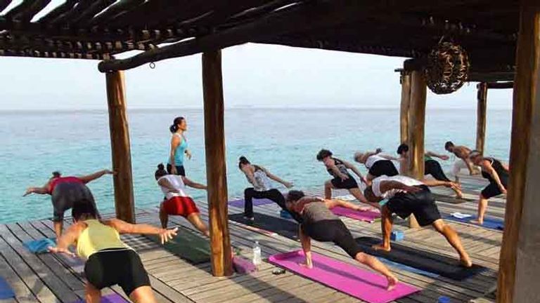 Hotel B Cozumel, an oceanfront boutique hotel, offers yoga classes to guests. // © 2016 Mexico Boutique Hotels