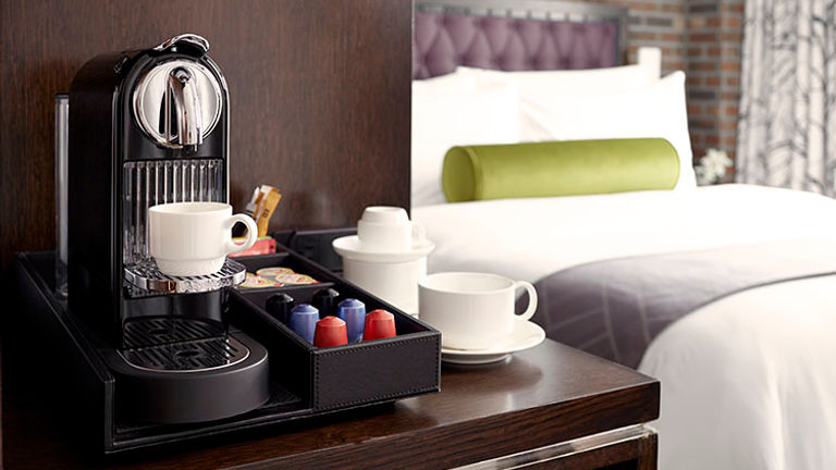 In-room amenities include a Nespresso machine, local turndown treats and more. // © 2016 Archer Hotel New York