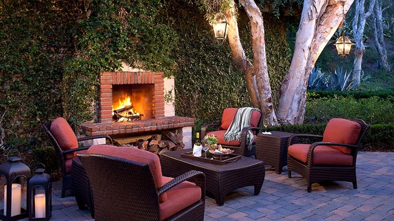 Outdoor fireplaces give the property a cozy vibe.