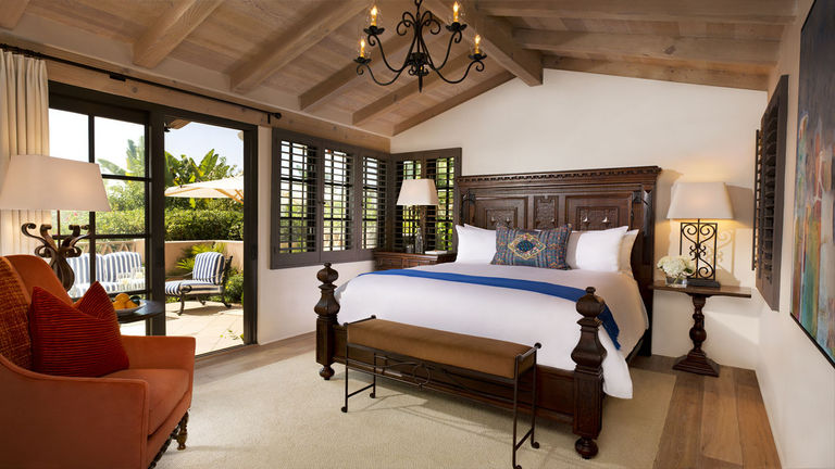 Rancho Valencia Resort & Spa offers 49 Spanish-style casitas featuring dark and light wood, a vaulted ceiling, warm colors and vibrant textiles.