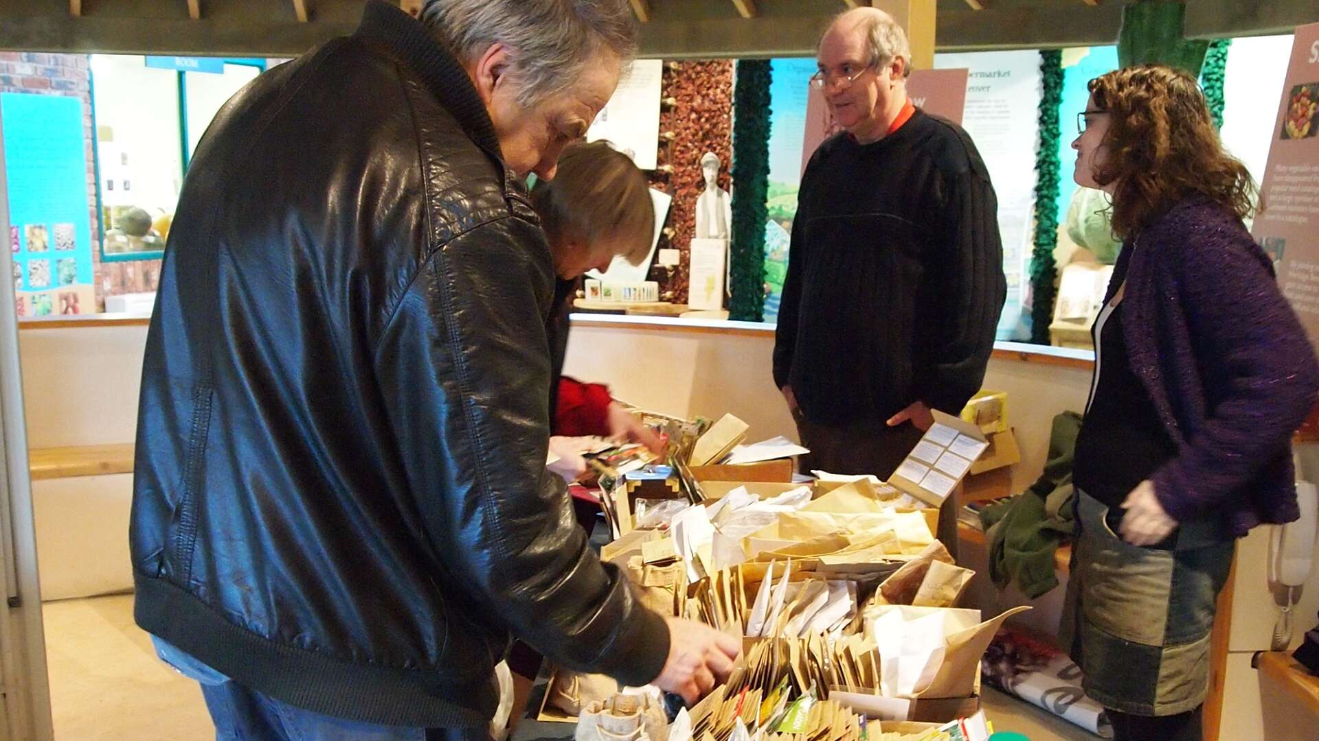 People at a seed swap stall