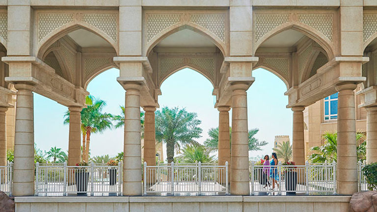 Swim under the bridge to a secluded pool. // © 2015 Christian Horan/Four Seasons Hotel Doha