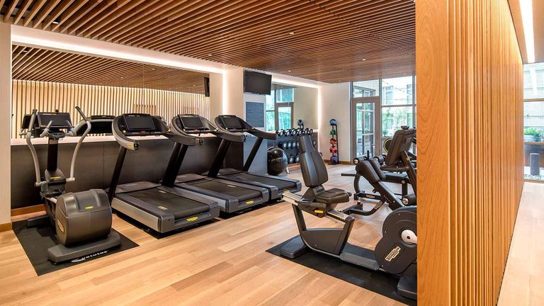 The Duniway’s fitness room features multiple treadmill and elliptical machines, as well as weight sets and medicine balls.