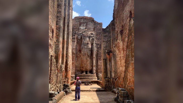 The Lankatilaka shrine is a giant stone-carved Buddha surrounded by 55-foot high walls.