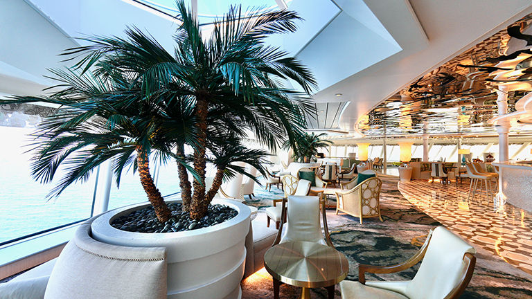 The Palm Court is a largely unaltered onboard space.