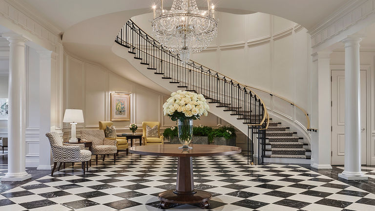 The property’s grand lobby entrance reflects the hotel’s ambition to feel like a residence.