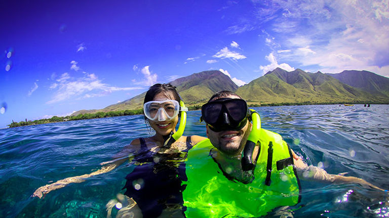 The writer and her partner snorkeling near Honolua Bay // © 2017 Trilogy Excursions