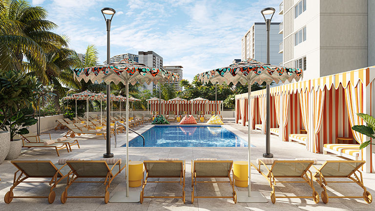 Waikiki Swim & Social Club features a pool and lounge areas, offers food service and hosts live music.