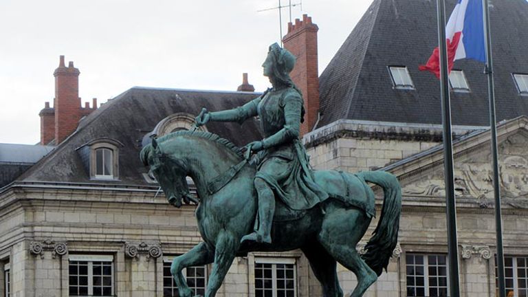 With this towering statue, the people of Orleans celebrate Joan of Arc heading into battle atop a prancing steed. // © 2017 Creative Commons user izrailit